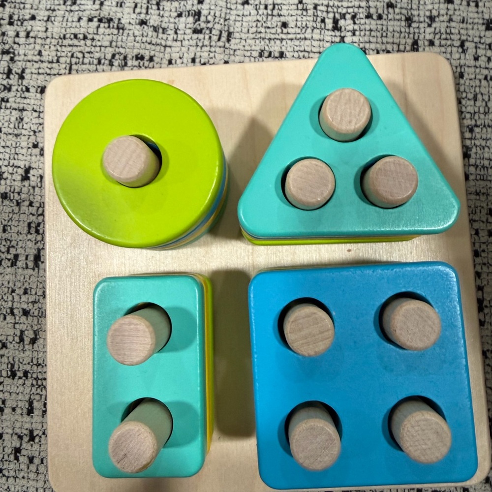 Vibrant Wooden Shape Sorting Puzzle includes all puzzle pieces